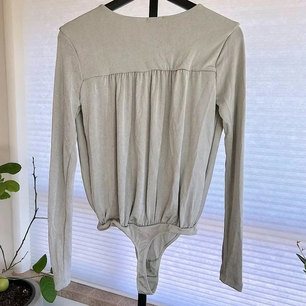 Free People Turnt Wrap Front Bodysuit Silver Metallic Small NWOT Contemporary